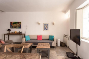 Air conditioned furnished apartment with a small terrace area near the port